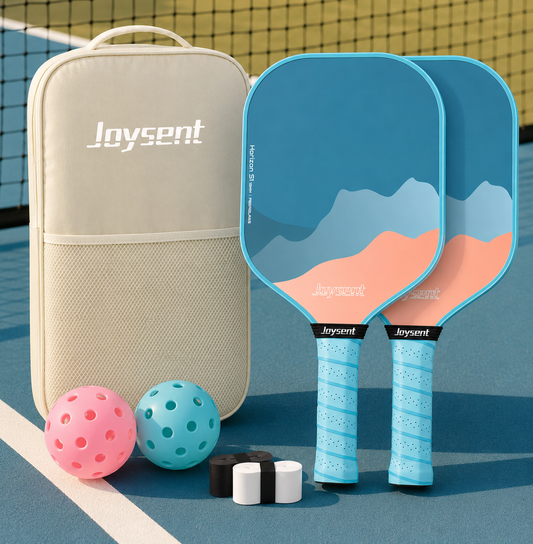 Pack duo pickleball Horizon bleu ciel avec deux raquettes assorties, housse de transport beige, grips et balles.