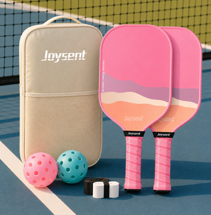 Kit complet de pickleball Horizon rose comprenant deux raquettes, un sac beige, quatre balles et deux surgrips.